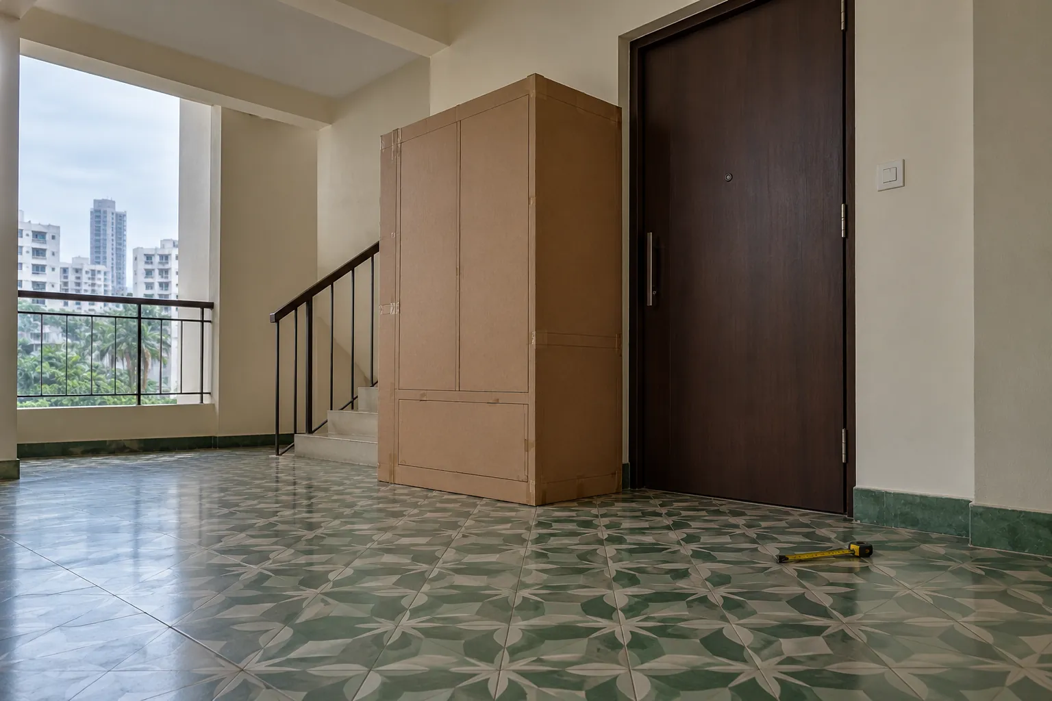 Apartment landing with a cabinet-size mock-up beside an entrance door